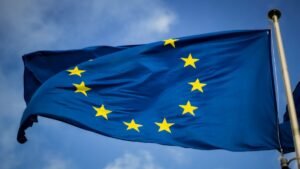 European Union flag waving against the sky – EU long-term residence in Spain